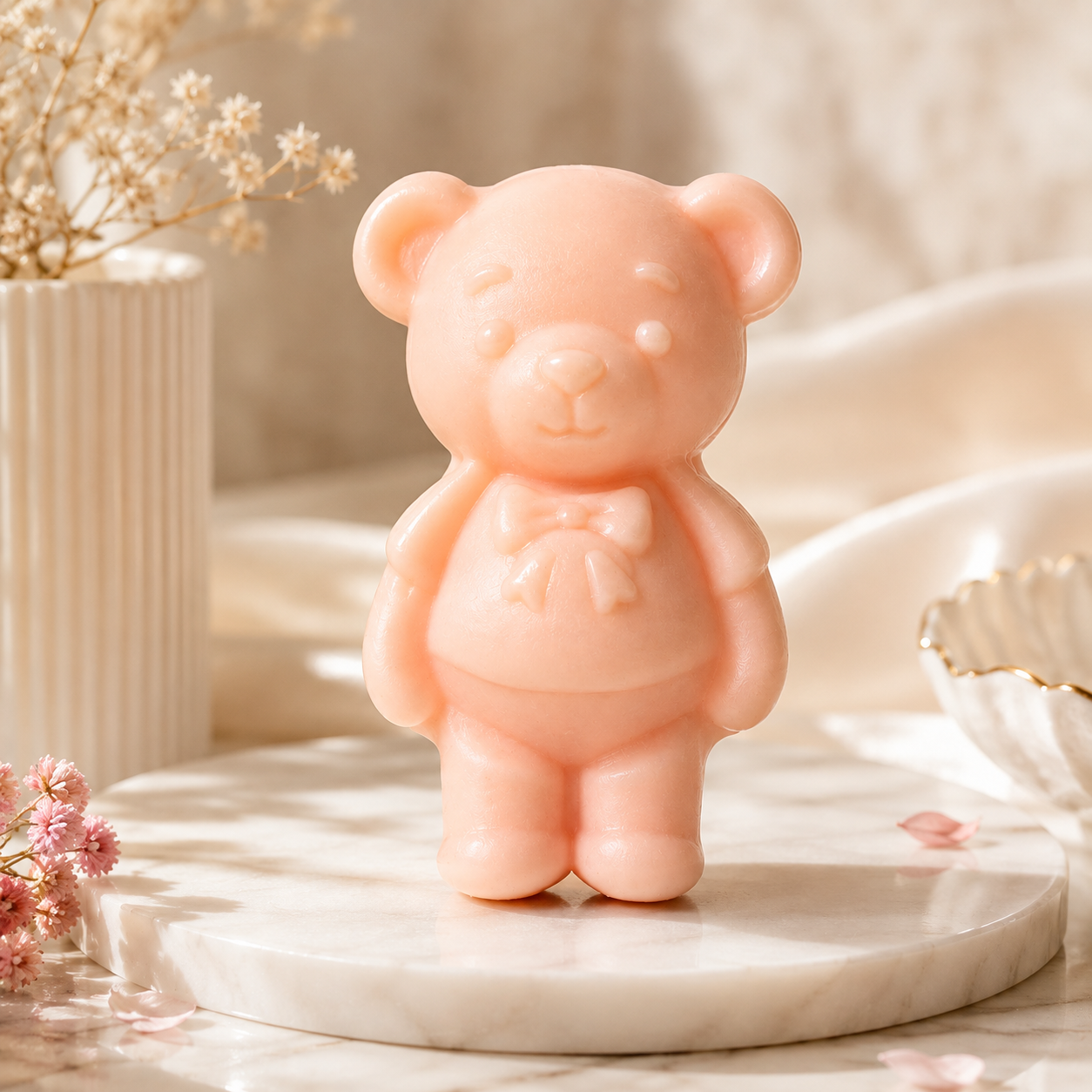 Single MIORAH Teddy Soap in blush pink on a marble dish